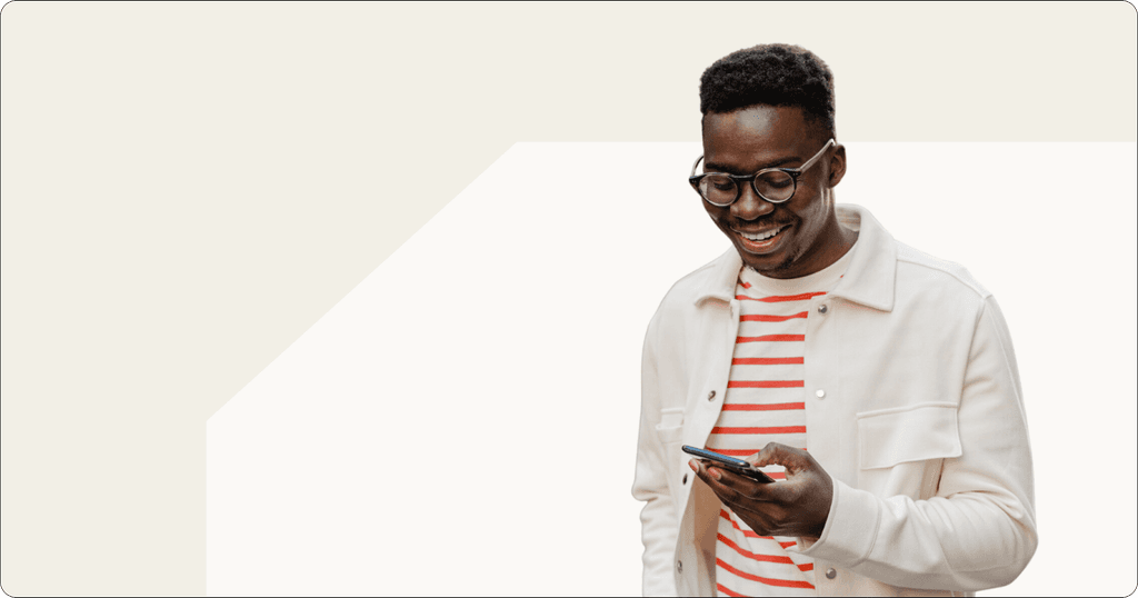 Young African man using smartphone