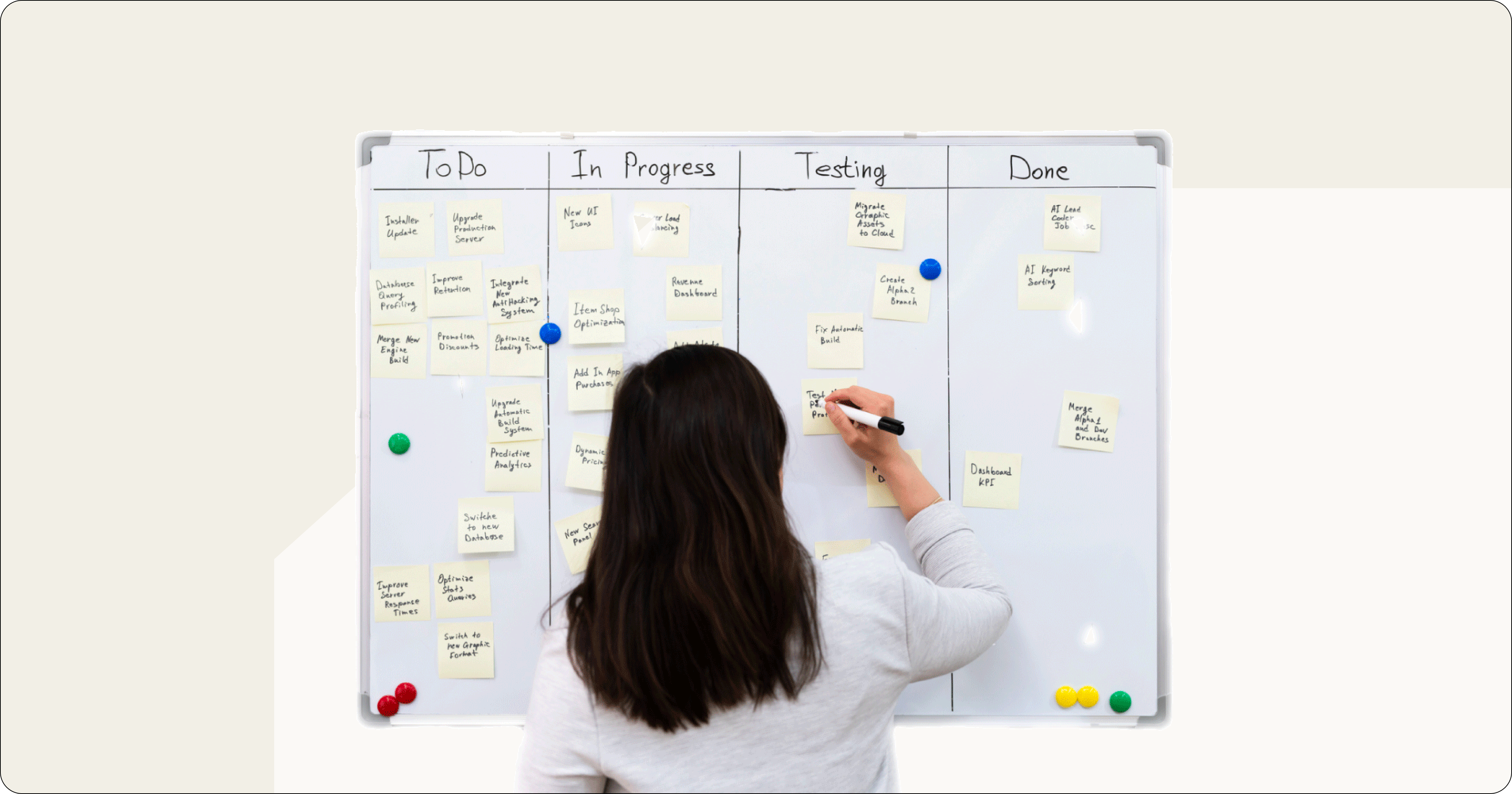 female office worker using an agile Kanban board