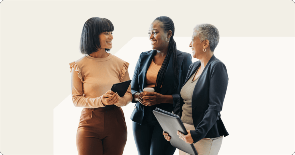 three women office workers having an agile daily stand up meeting