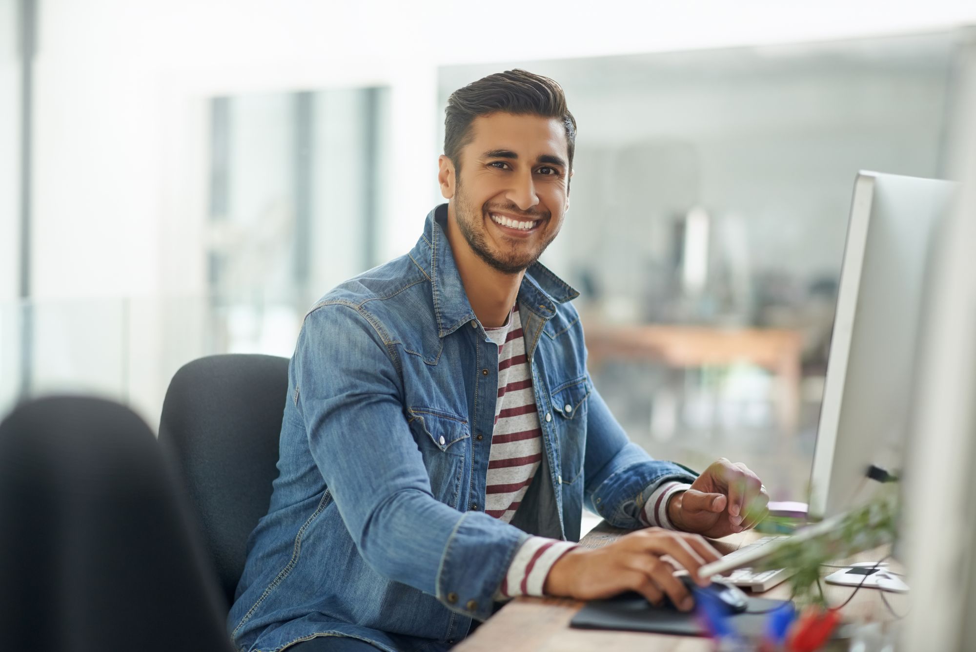 Millenial working on computer